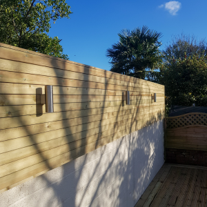Horizontal timber fence screening with lights